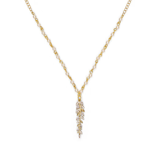 A leaf shaped pendant descends from a gold chain necklace.