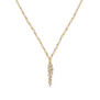 A leaf shaped pendant descends from a gold chain necklace.