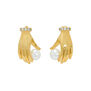 Gold hand-shaped stud earrings holding imitation pearls, with jeweled cuffs.