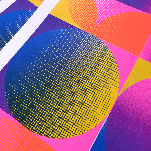 Detail of a risograph print featuring colourful geometric shapes.