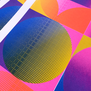 Detail of a risograph print featuring colourful geometric shapes.