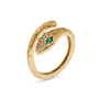 Spiraling snake ring with green eyes and crystal-encrusted head