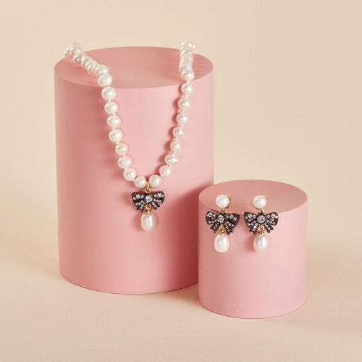 Marie Antoinette inspired pearl and bow earrings by Margaux Studios