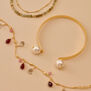 Faux pearl bangle by Fotini Liami