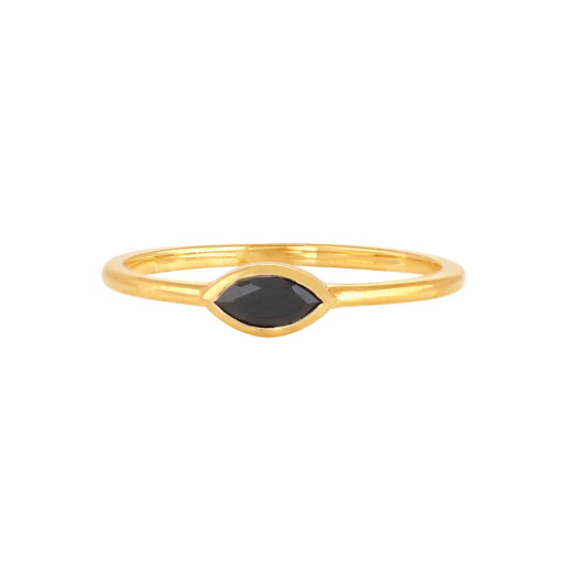 A dainty gold ring with a small marquise cut black stone.