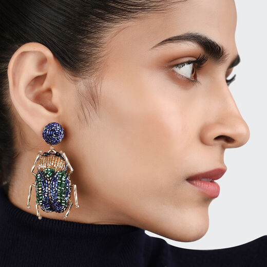 Beetle beadwork earrings by Olivia Dar