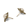 Pearl stud earrings by Michael Michaud