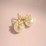 Pearl flower stud earrings by Carousel Jewels