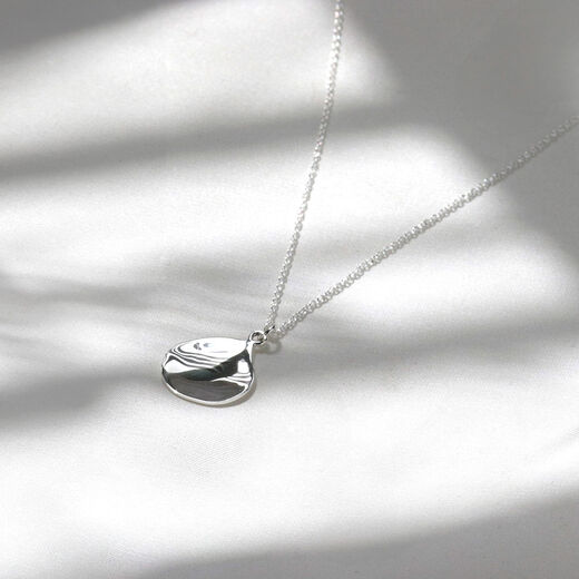 Silver teardrop pendant necklace by Mounir