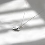 Silver teardrop pendant necklace by Mounir