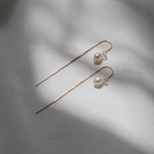 Pearl and opal threader earrings by Mounir