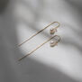 Pearl and opal threader earrings by Mounir