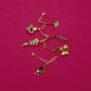 Paperclip chain charm bracelet by Michael Michaud