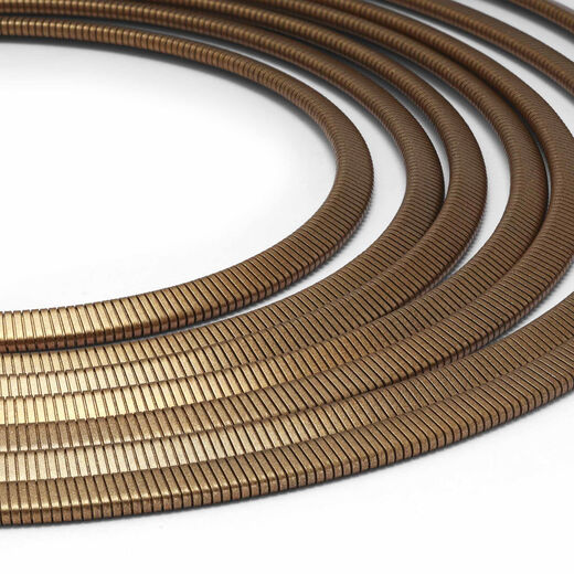 A close up of the necklace strands of cobra chain.