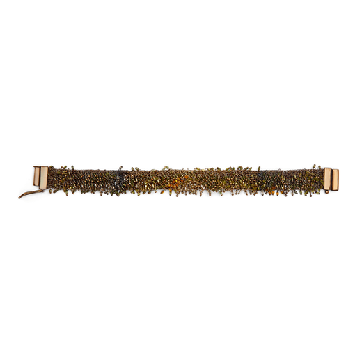 A beaded bracelet in warm tones.