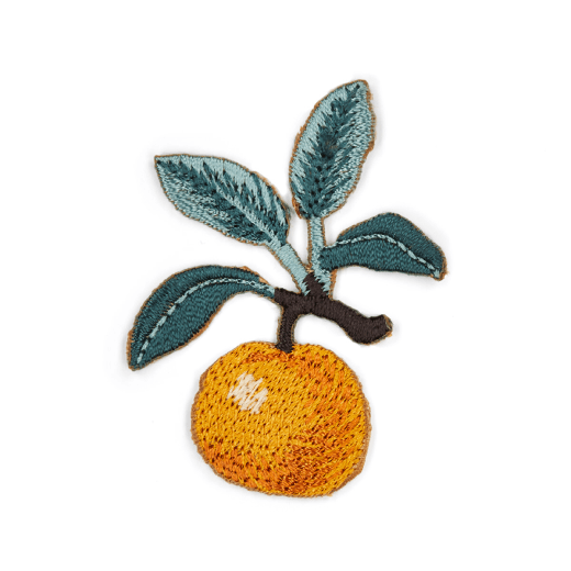An embroidery patch in the shape of an orange branch. Four green leaves and one orange sprout from the branch.