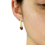 Garnet triangular earrings by Mounir