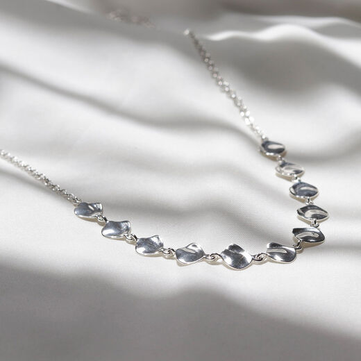 Silver teardrop necklace by Mounir