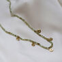 Green garnet charm necklace by Mounir