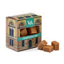 A decorated box containing cream clotted fudge cubes.