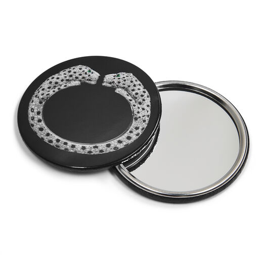 Glossy image on one side, mirror on the other