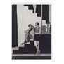 Greeting card featuring a vintage image of models wearing Schiaparelli&rsquo;s beachwear with this chic greeting card. Schiaparelli's collaborator, Bettina Jones, is captured in understated beachwear alongside a male model on a Modernist set. A subtle surreal touch is made, in the form of the disembodied mannequin legs at the top of the photograph.  Created exclusively to accompany the Schiaparelli: Fashion Becomes Art exhibition, the card is made from premium, responsibly sourced paper and is blank inside for your own message shoot by Schiaparelli George Hoyningen-Huene