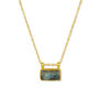 A gold chain necklace featuring a rectangular shaped labradorite pendant.