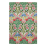 Tea towel featuring a green and red botanical pattern with parrots.