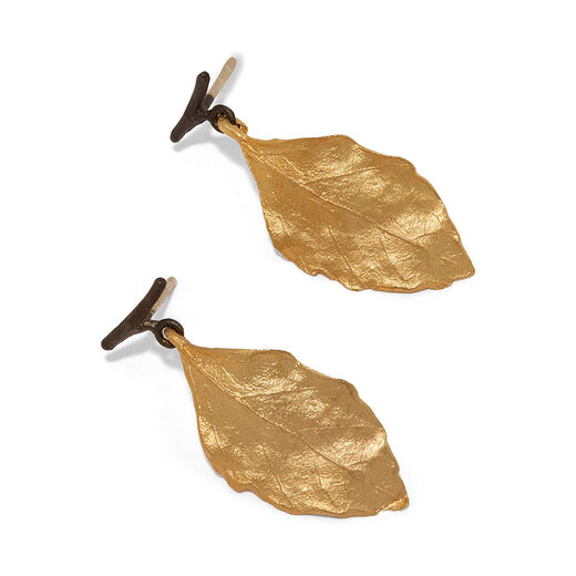 A pair of bronze earrings cast from birch leaves.