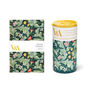 A small notebook and a carry cup, both printed with a green foliage pattern.