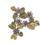 Glass and hand painted bronze brooch featuring a waterlily design