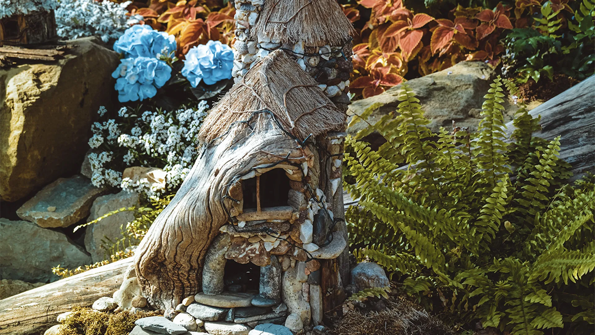 Fairy house made from wood and stone