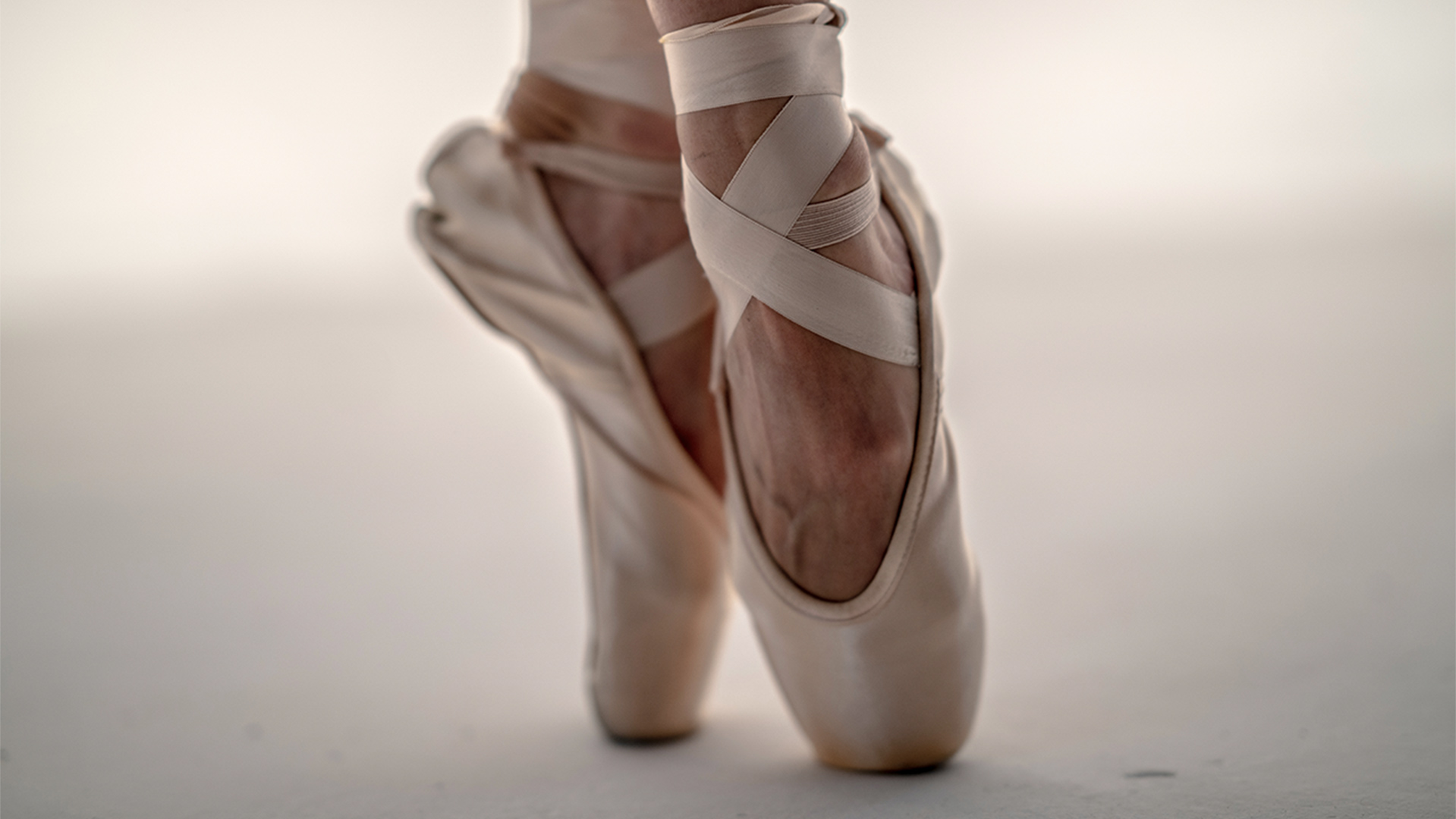 Close up of a ballerinas feet on tip toes