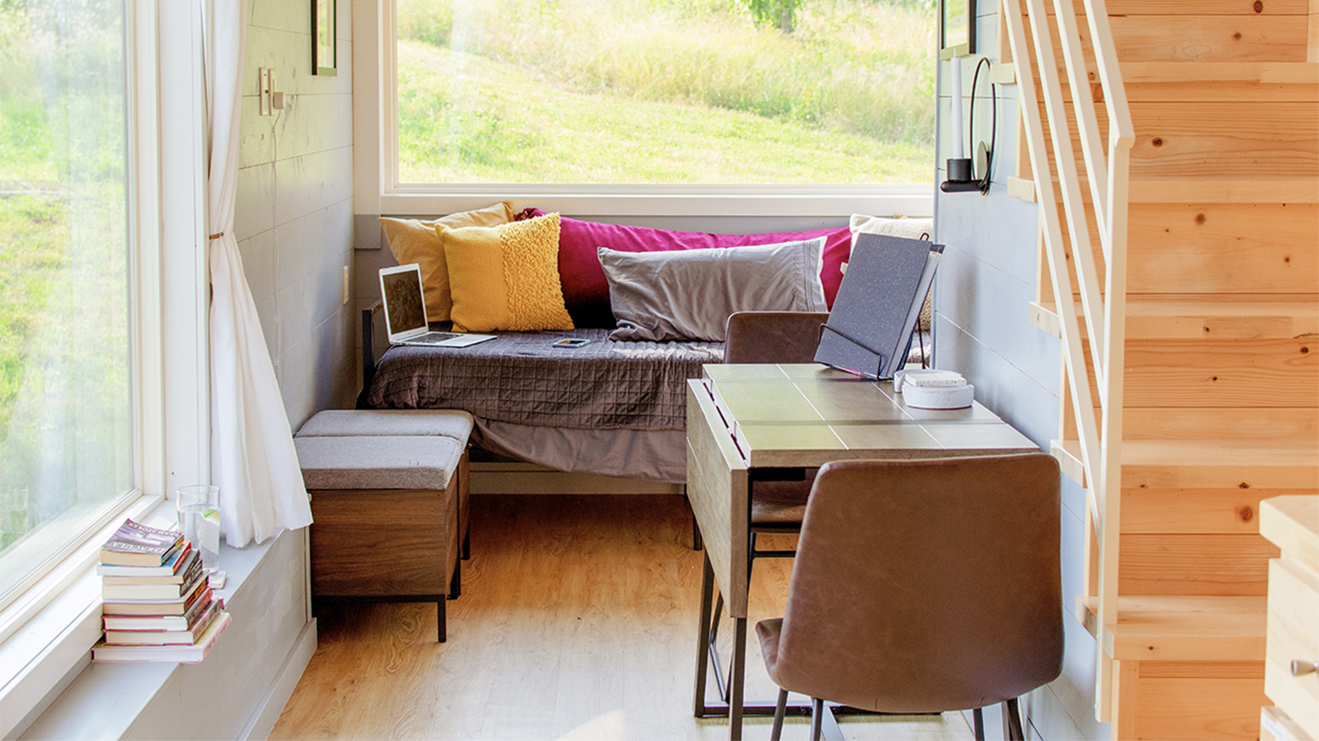 Cosy snug in a sunlit room in a tiny home.