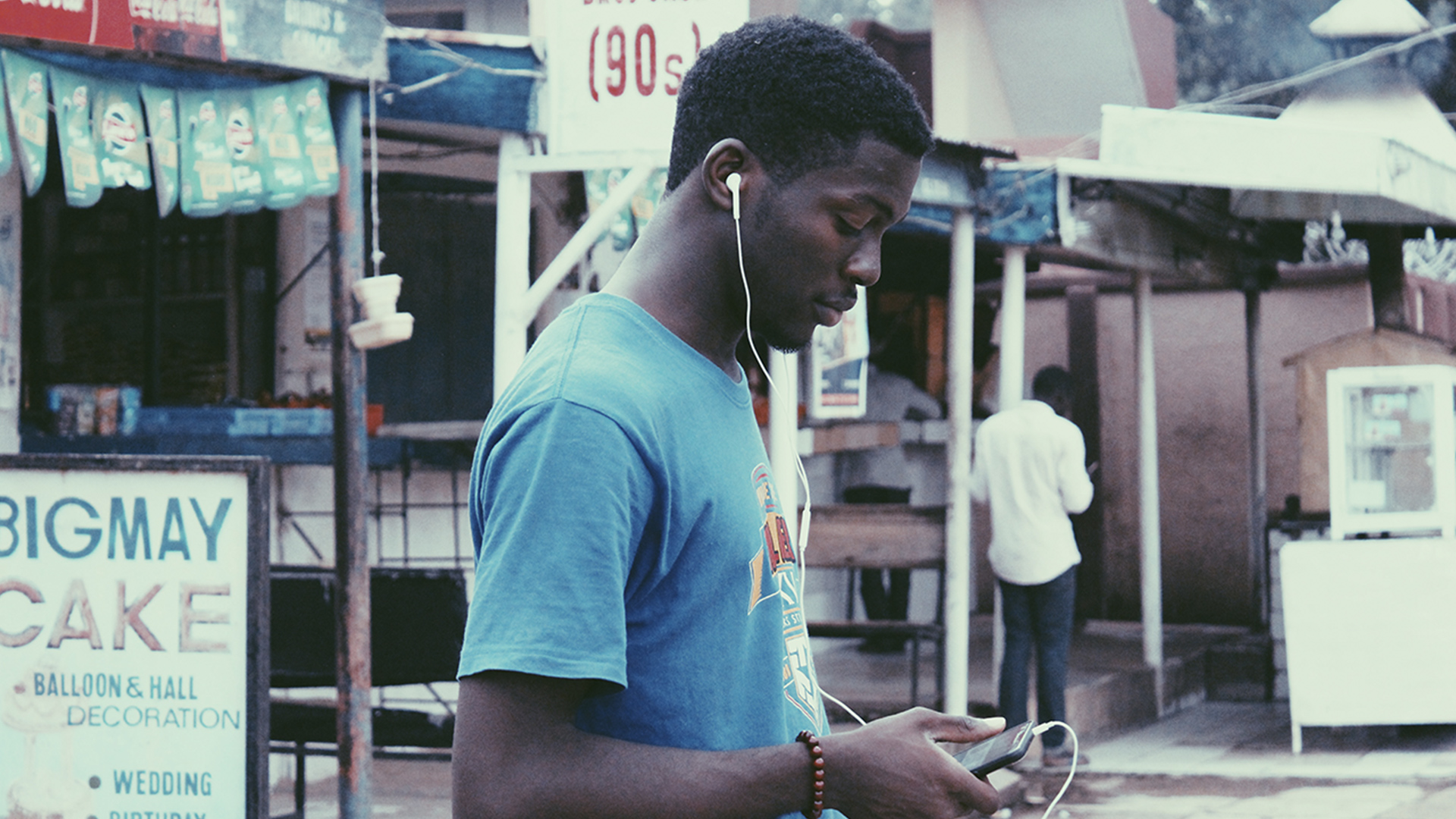 A man listening to music on his phone