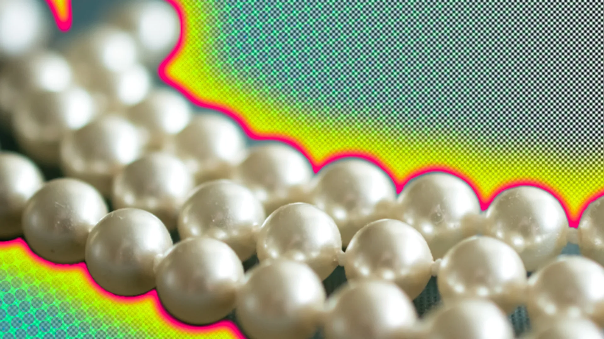 A close up of a pearl necklace with a polkadot background and a glow around the image