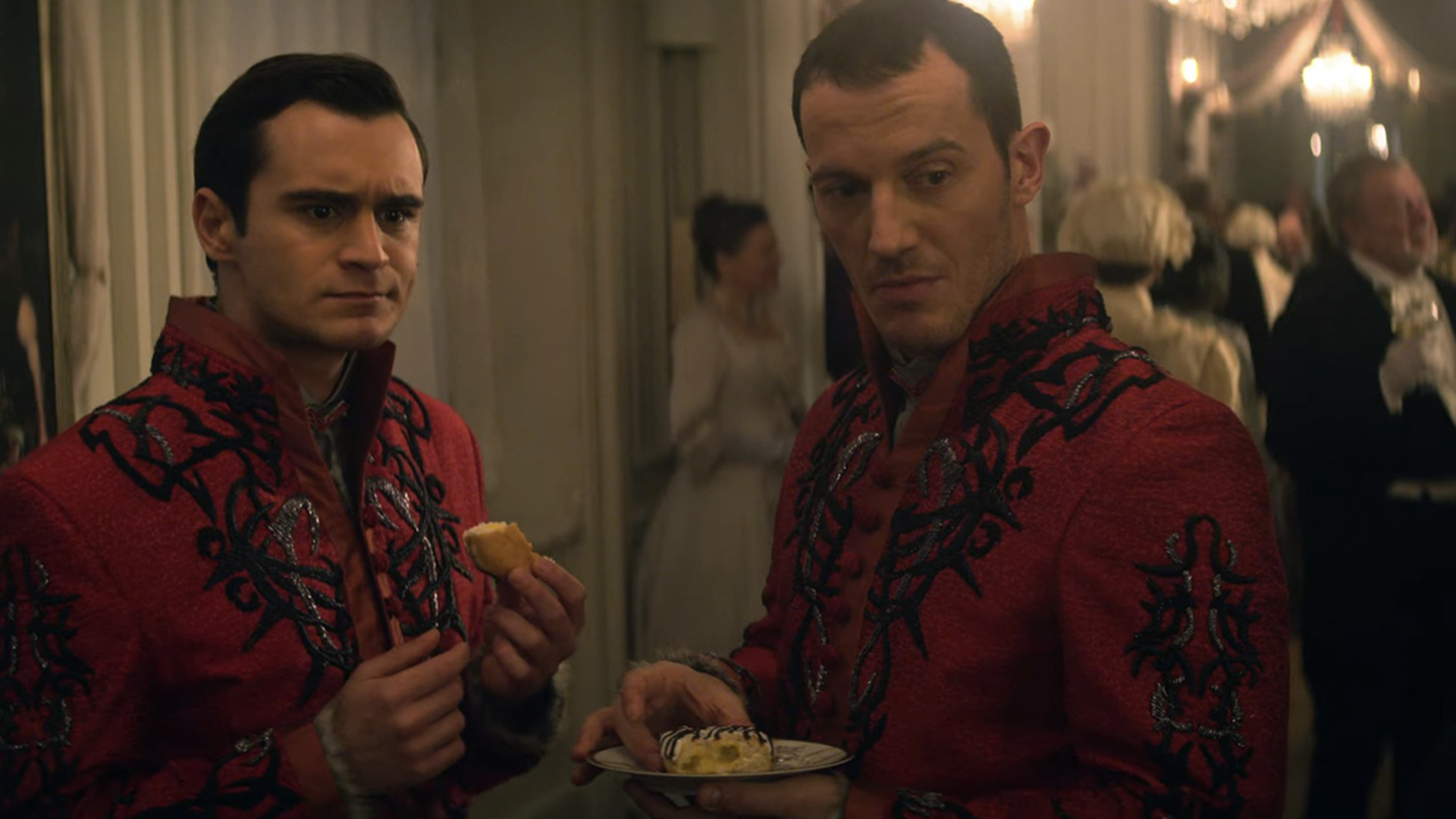Two red-robed Grisha