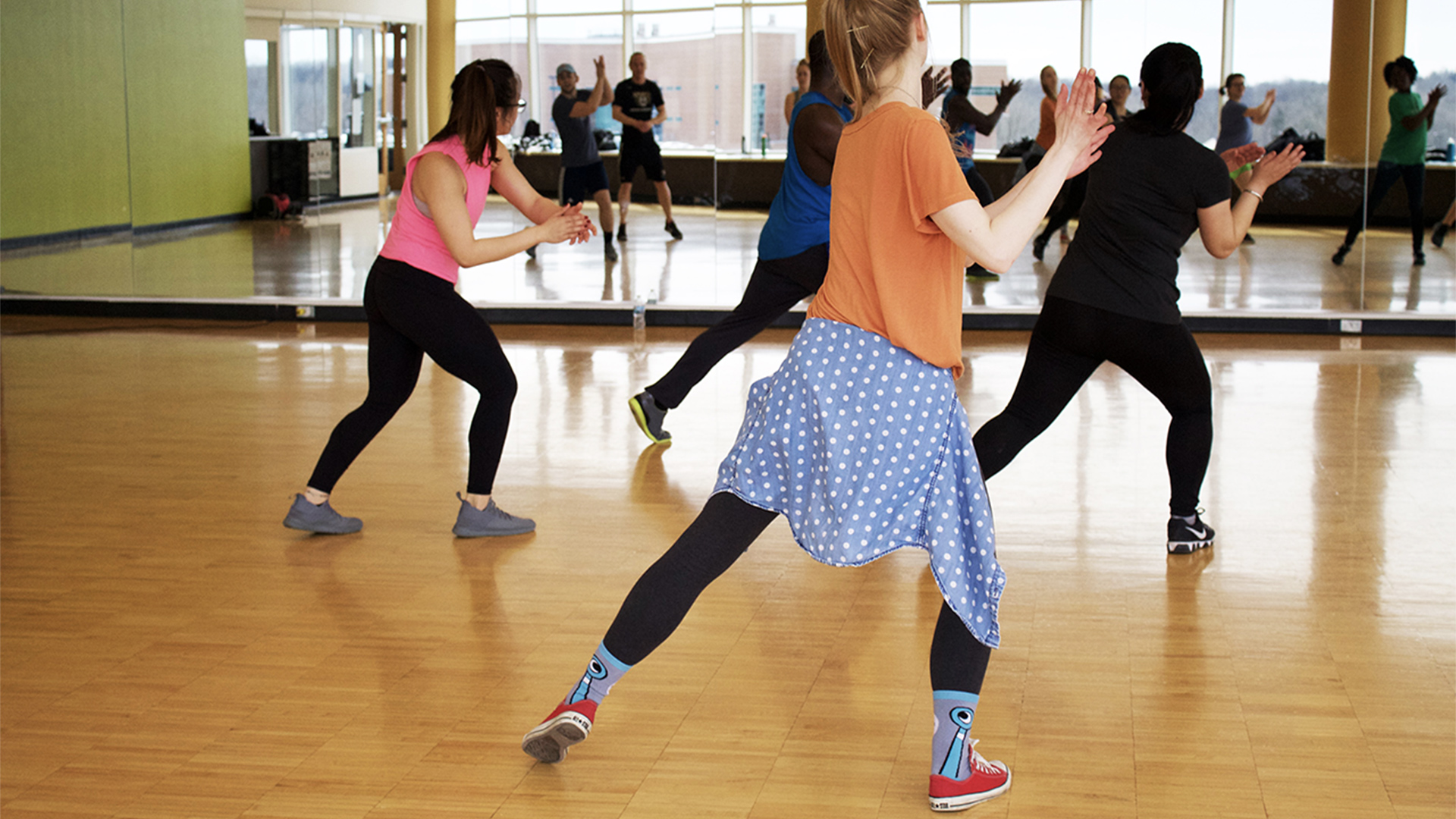 People working out in a dance studio