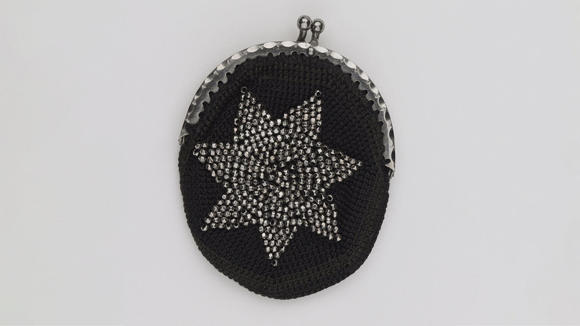 Black silk purse with bead embroidery