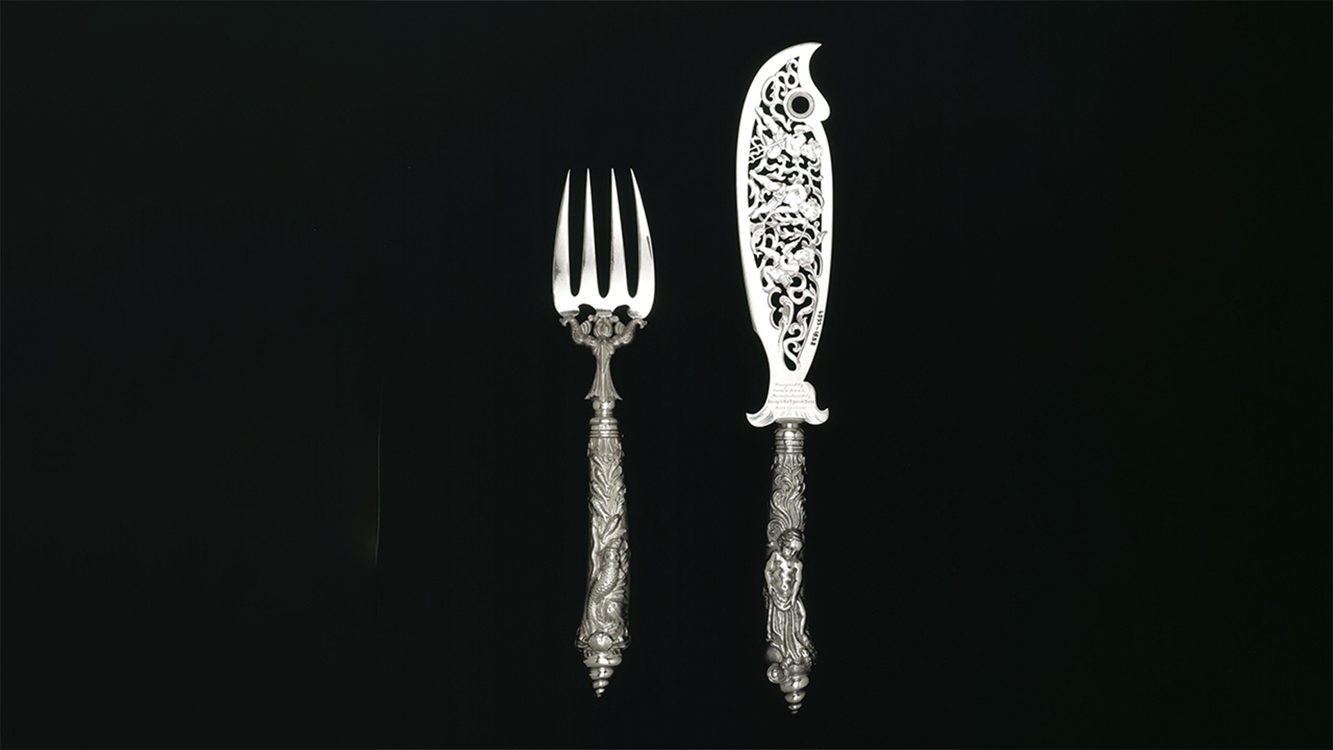 Silver knife with patterned blade