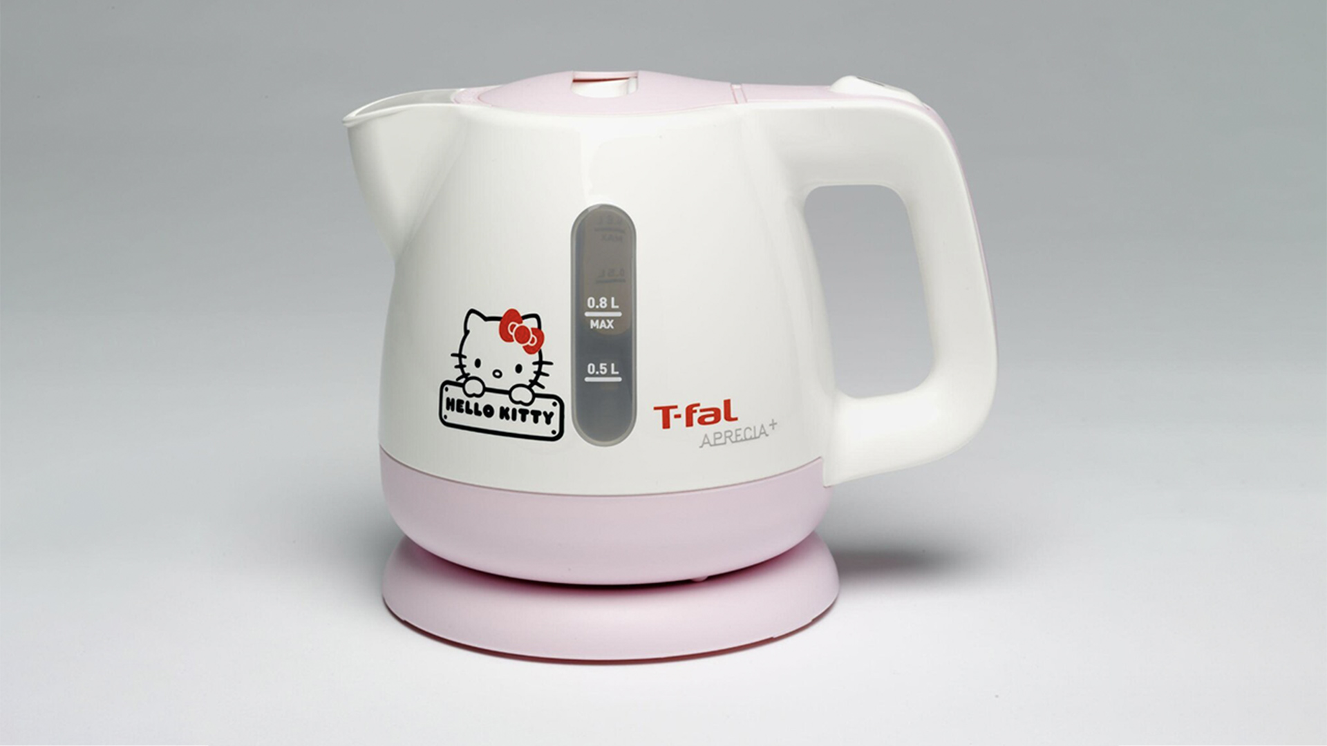 Pink and white plastic Hello Kitty kettle