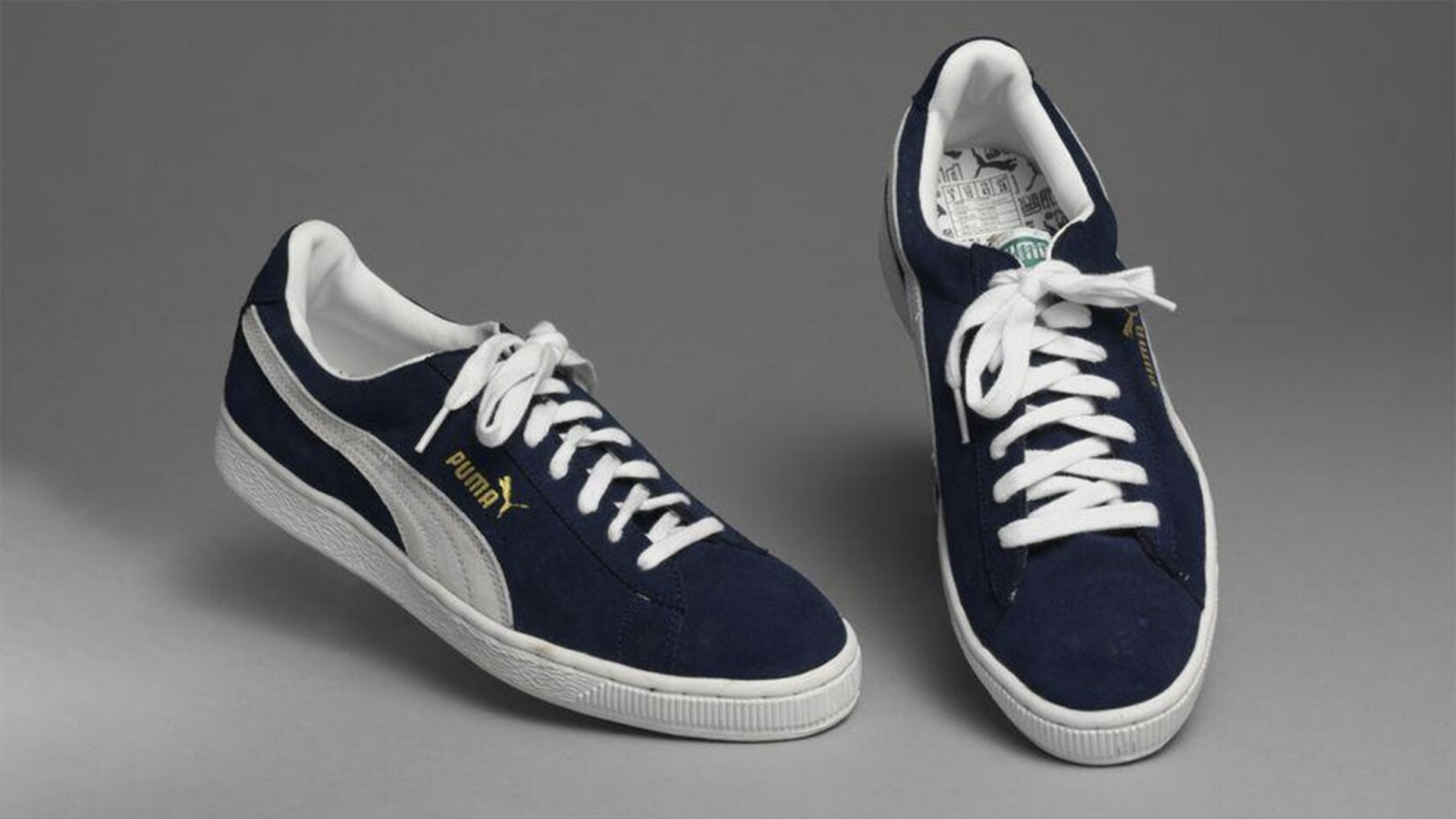 Blue and white Puma trainers