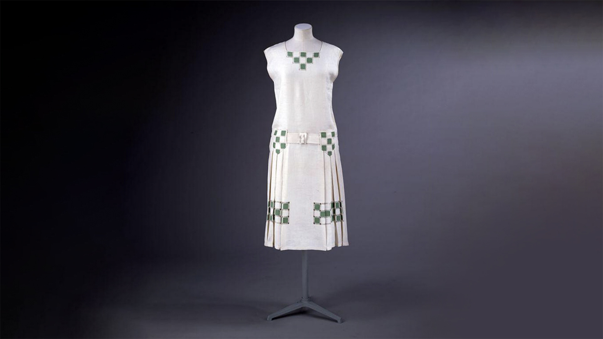 White tennis outfit with green squares