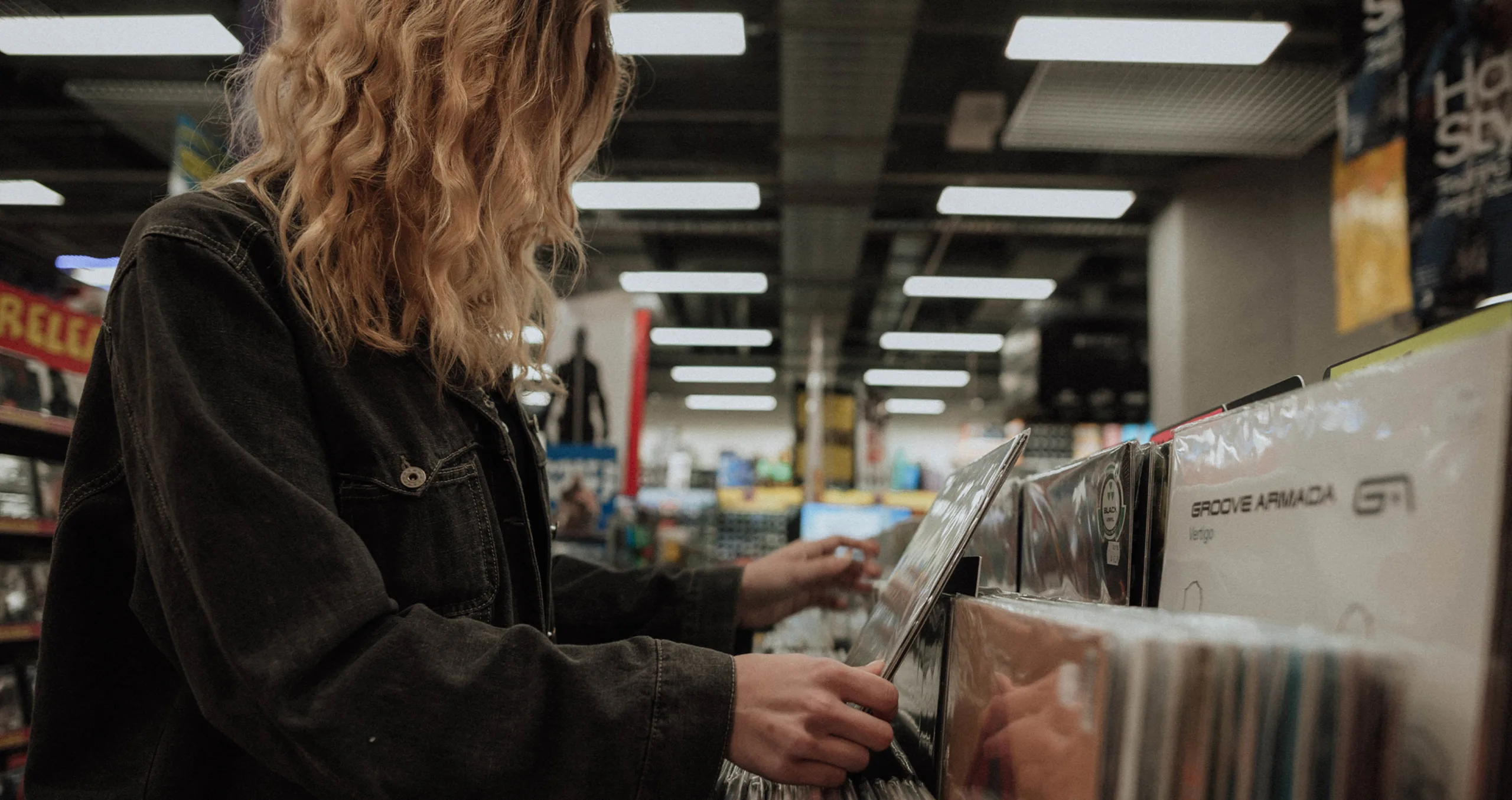 A woman going record shopping
