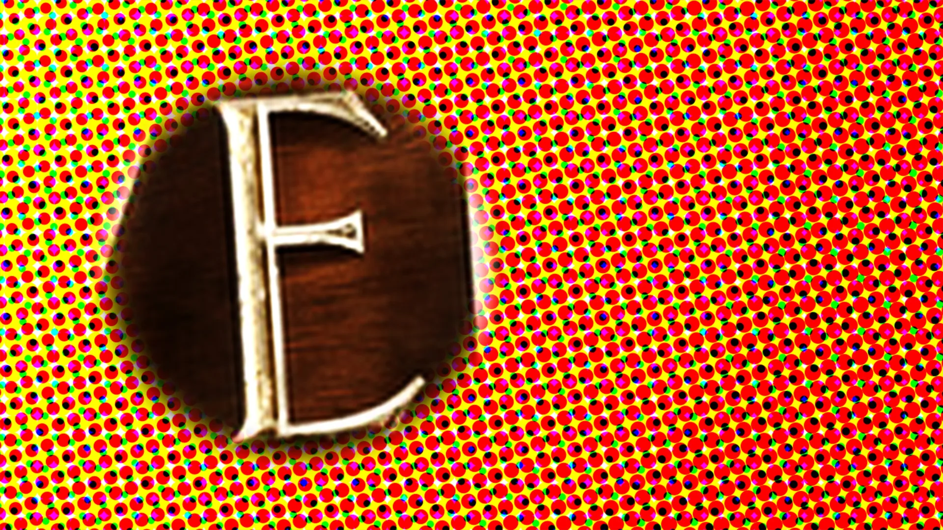 The letter 'E' in a grand, gold font
