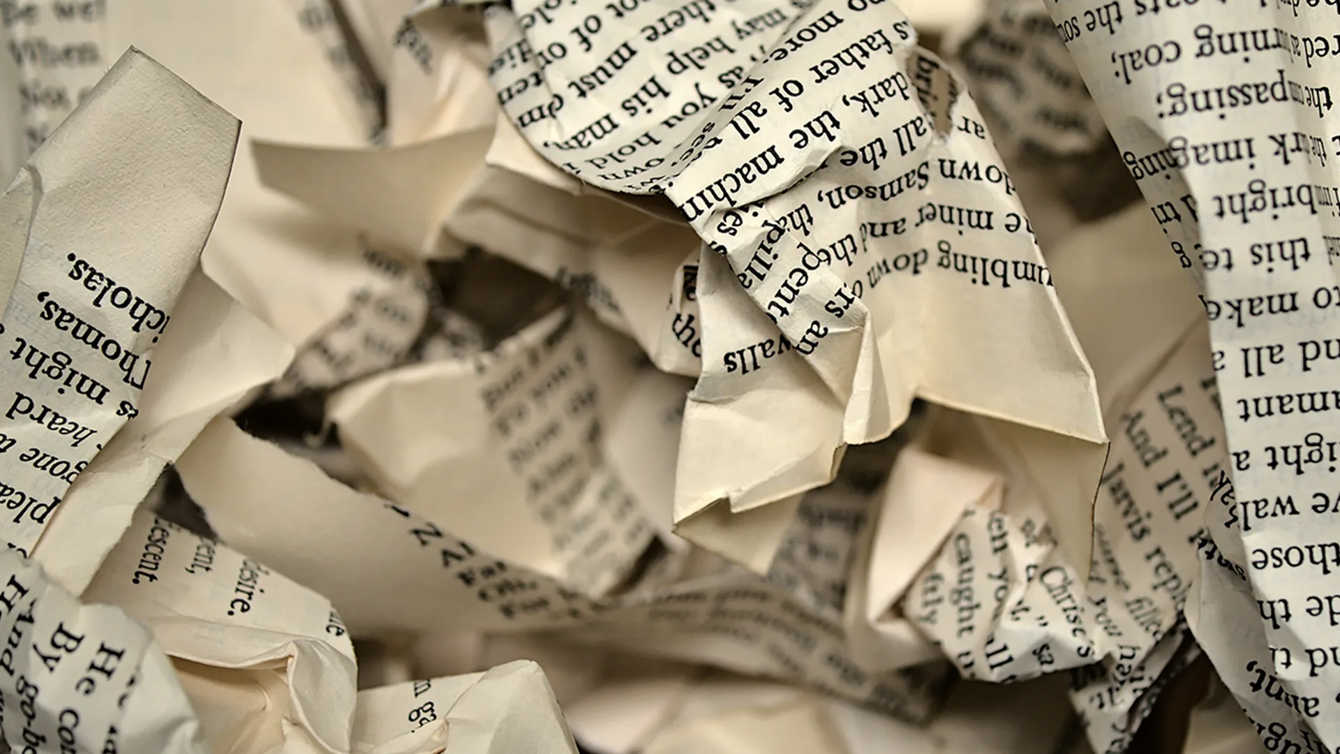 Crumpled up pages from a book
