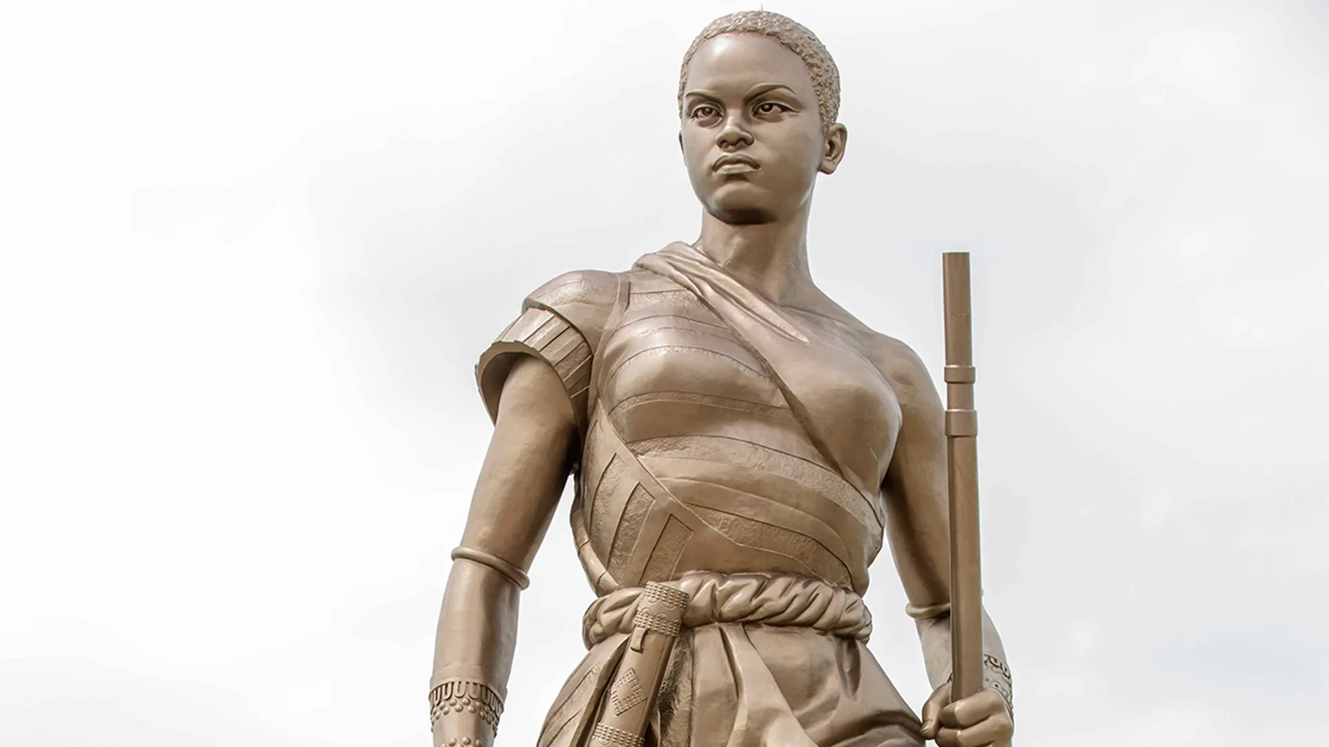 Bronze statue of a determined warrior woman