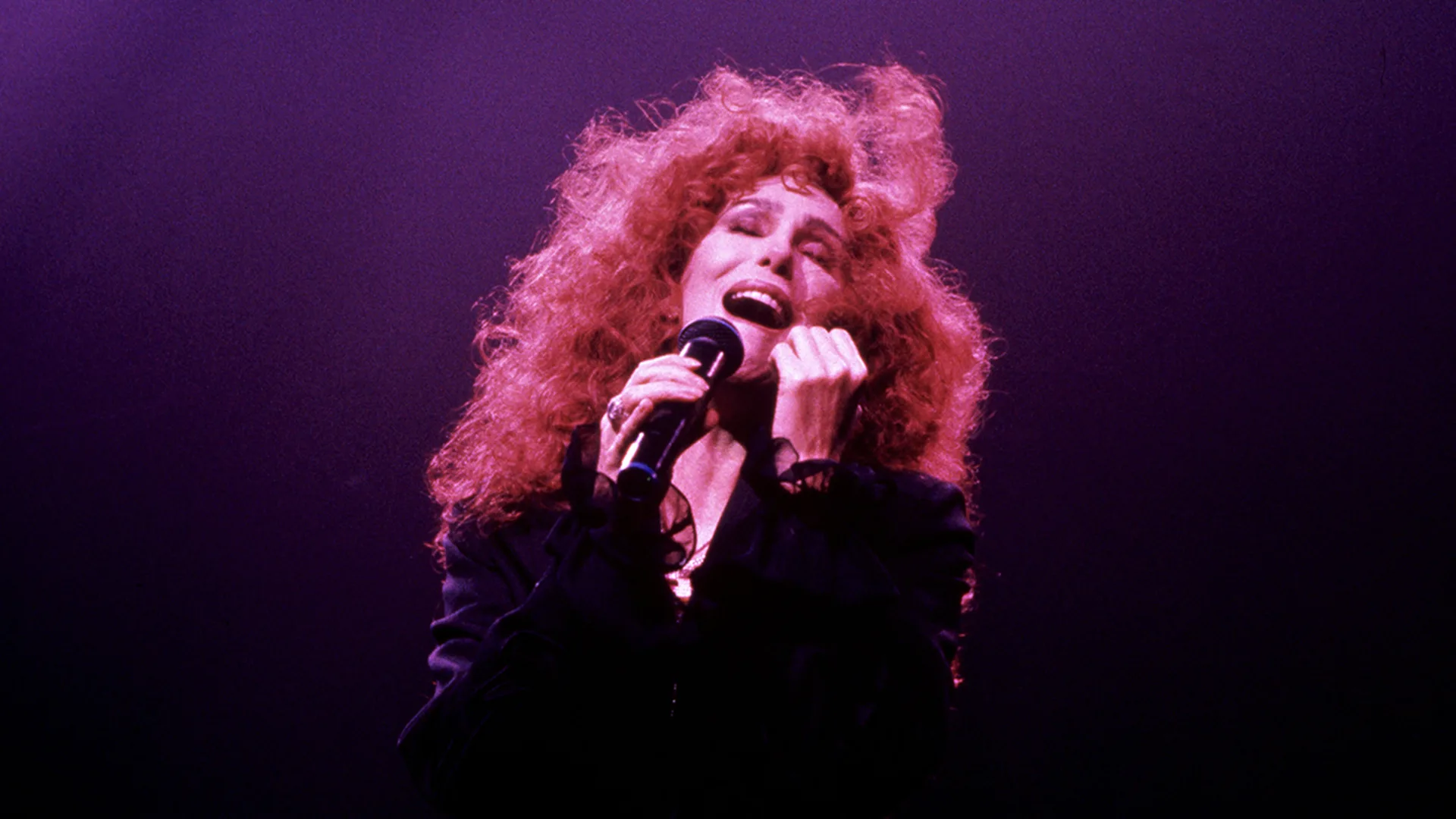 Cher performing on stage