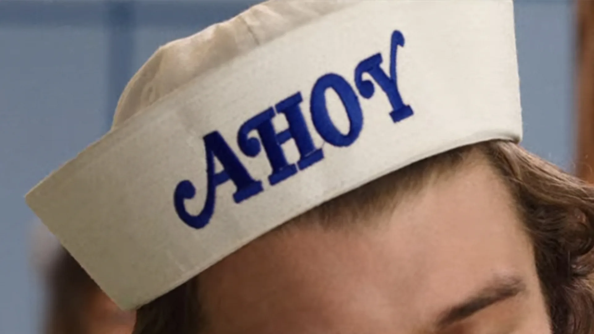 A sailor's hat that says 'ahoy'
