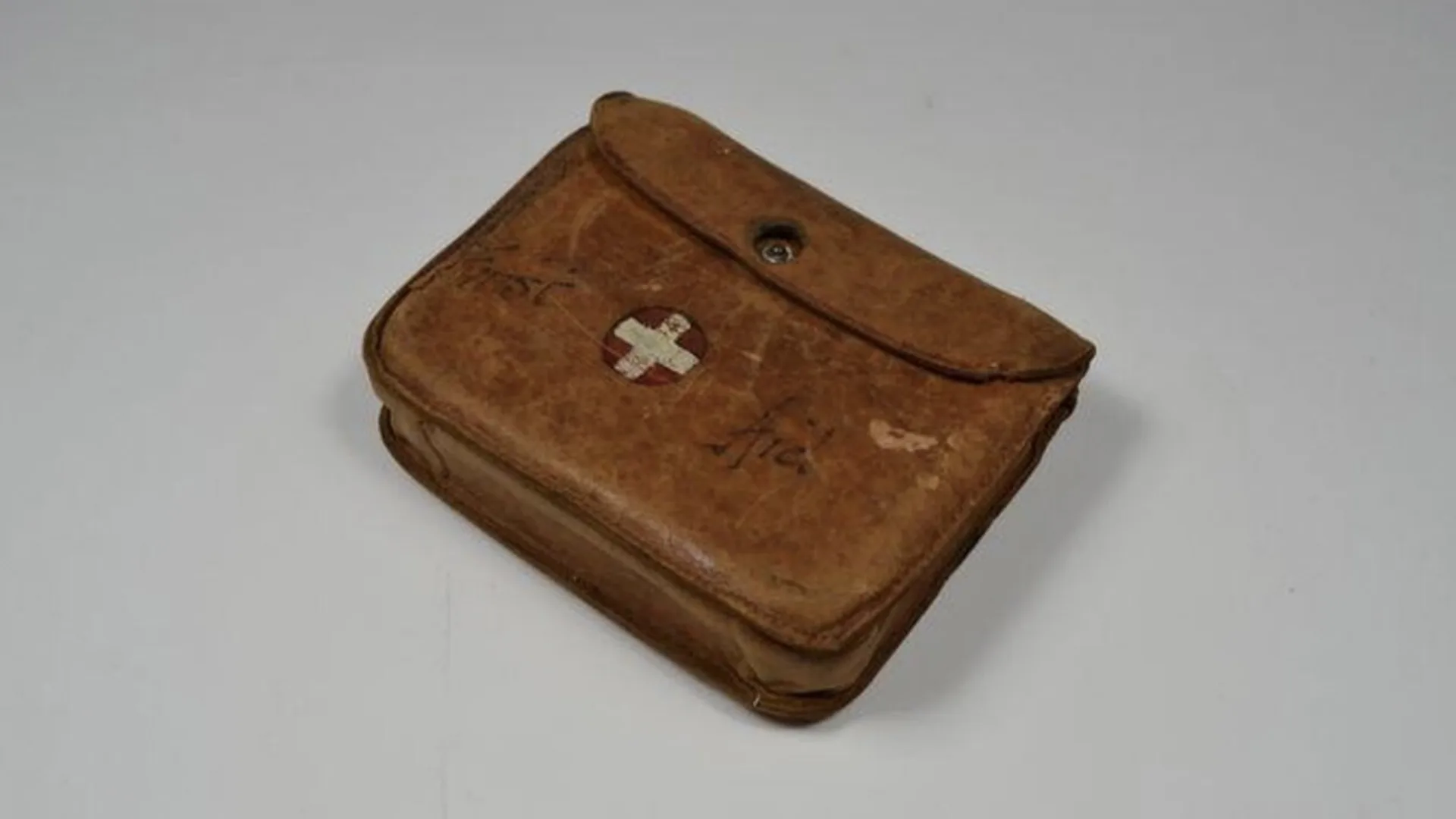 First aid kit in a brown leather pouch